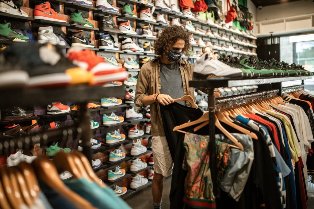 A Man Shopping for Clothes at a Sneaker Shop